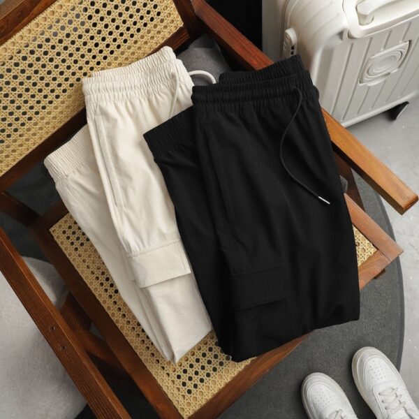 q38 Quần gió Jogger túi hộp QNA004